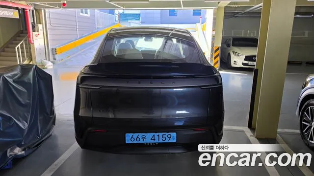 Tesla Model Y — Фото автомобиля 4