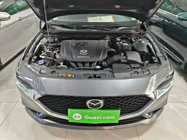 Mazda Axela — Фото автомобиля 19