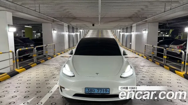 Tesla Model Y — Фото автомобиля 7