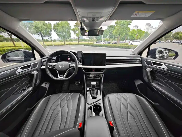 Volkswagen Tiguan L — Фото автомобиля 11
