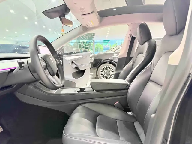 Tesla Model Y — Фото автомобиля 7