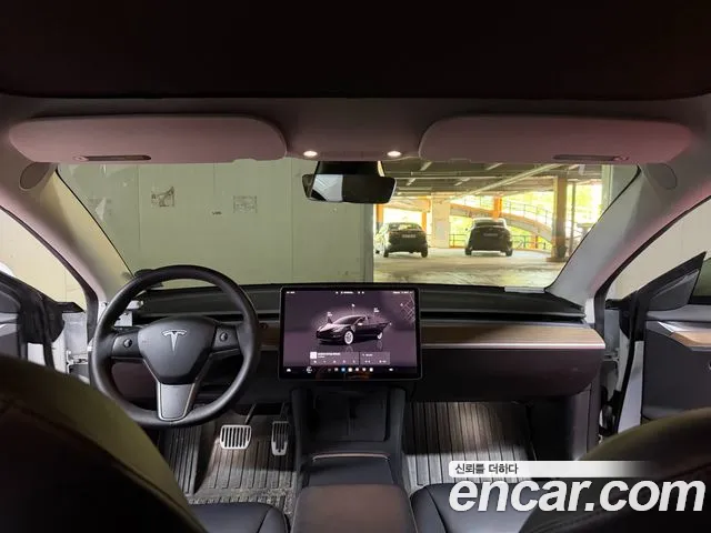 Tesla Model 3 — Фото автомобиля 7