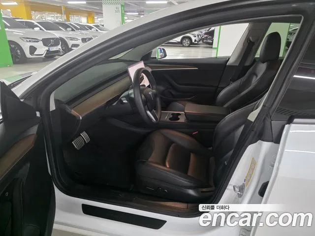 Tesla Model 3 — Фото автомобиля 8
