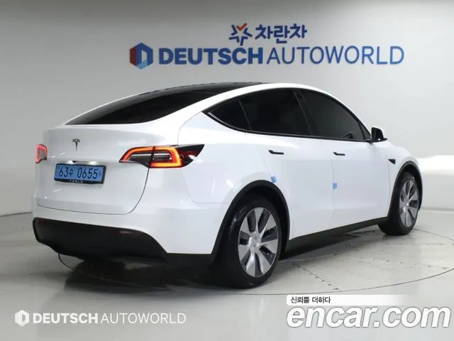 Tesla Model Y — Фото автомобиля 2