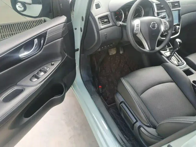Nissan Tiida — Фото автомобиля 15