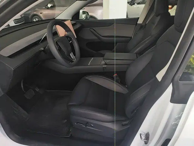 Tesla Model Y — Фото автомобиля 14