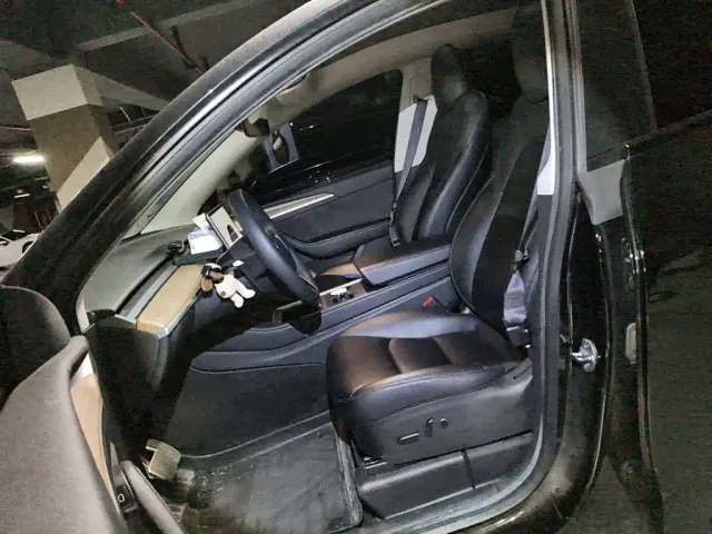 Tesla Model Y — Фото автомобиля 11