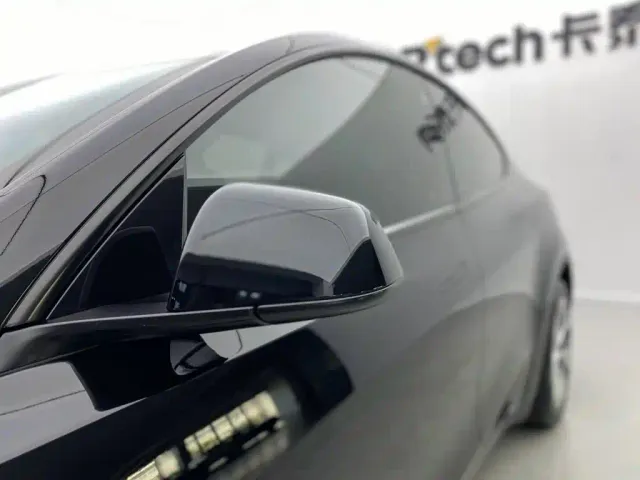 Tesla Model Y — Фото автомобиля 14