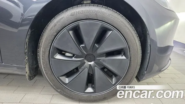 Tesla Model 3 — Фото автомобиля 6