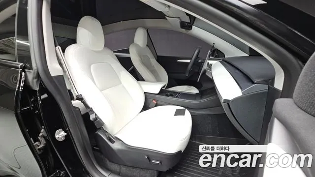 Tesla Model Y — Фото автомобиля 26