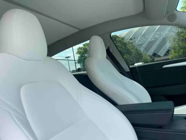 Tesla Model Y — Фото автомобиля 12