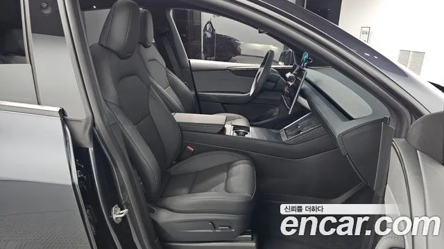 Tesla Model Y — Фото автомобиля 16