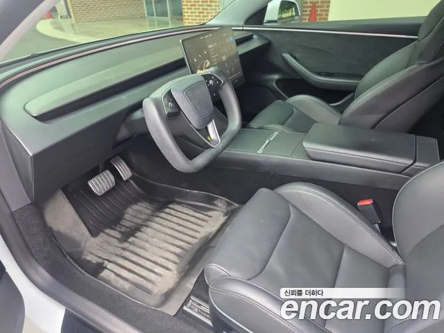 Tesla Model 3 — Фото автомобиля 14