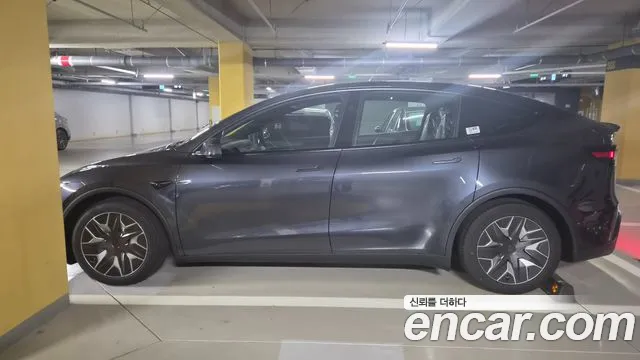 Tesla Model Y — Фото автомобиля 3