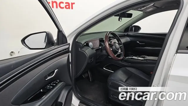 Hyundai Tucson Tucson (NX4) Бензин 1.6 турбо 2WD — Фото автомобиля 10