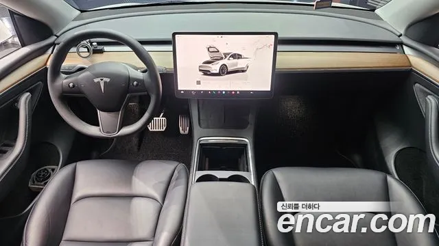 Tesla Model Y — Фото автомобиля 6
