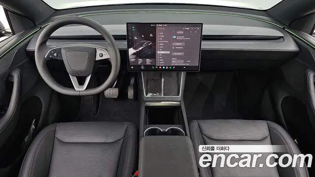 Tesla Model Y — Фото автомобиля 10