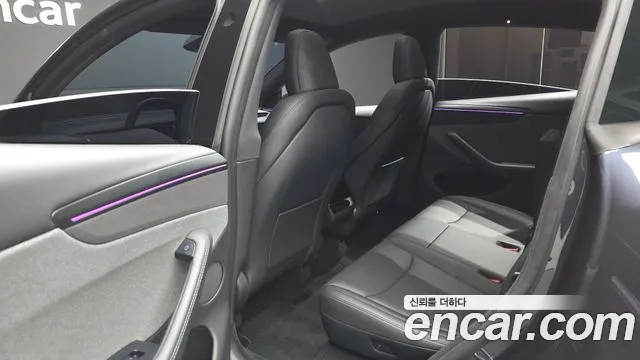Tesla Model Y — Фото автомобиля 16
