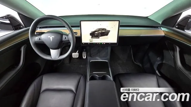 Tesla Model Y — Фото автомобиля 7
