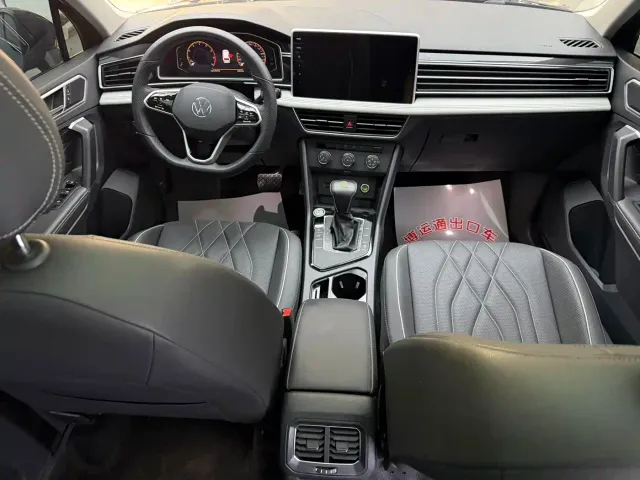 Volkswagen Tiguan L — Фото автомобиля 11
