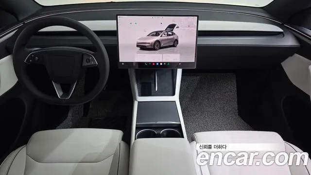 Tesla Model Y — Фото автомобиля 7