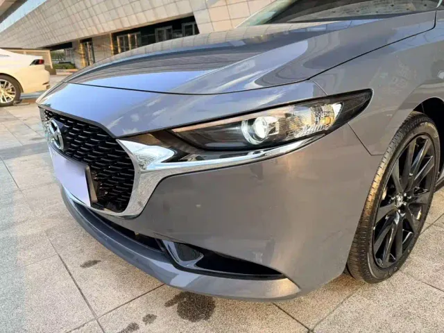 Mazda Axela — Фото автомобиля 15