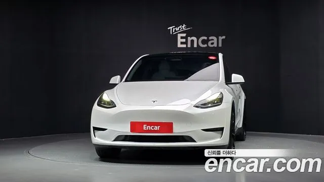 Tesla Model Y — Фото автомобиля 3