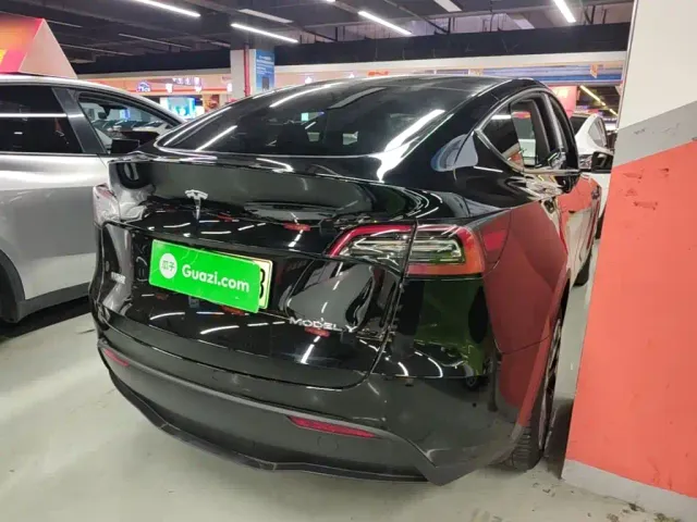 Tesla Model Y — Фото автомобиля 6