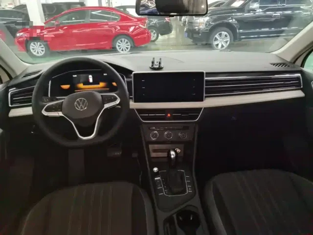 Volkswagen Tiguan L — Фото автомобиля 9