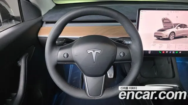 Tesla Model Y — Фото автомобиля 18