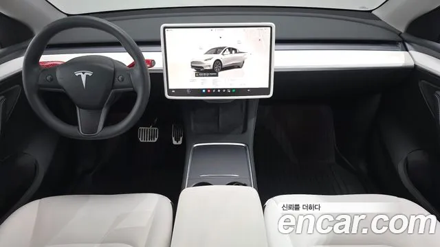 Tesla Model Y — Фото автомобиля 7