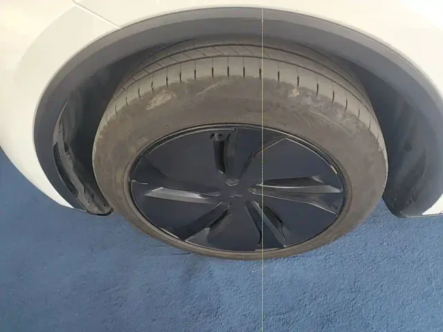 Tesla Model Y — Фото автомобиля 22