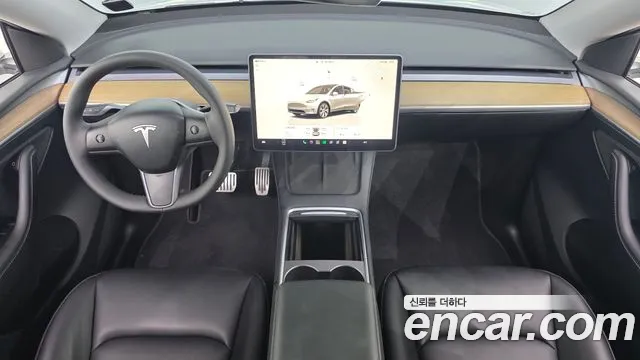 Tesla Model Y — Фото автомобиля 10