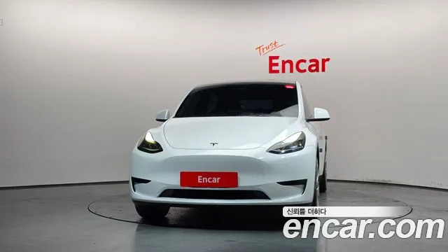 Tesla Model Y — Фото автомобиля 3