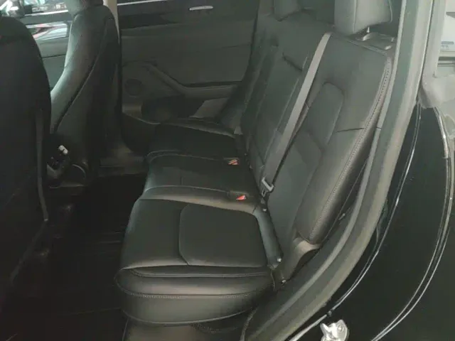 Tesla Model Y — Фото автомобиля 12