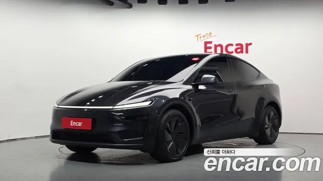 Tesla Model Y — Фото автомобиля 8