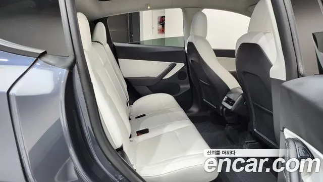 Tesla Model Y — Фото автомобиля 10
