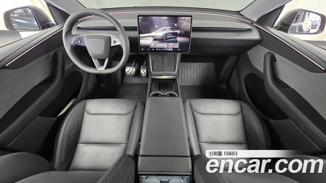 Tesla Model Y — Фото автомобиля 10