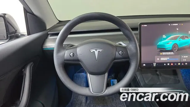 Tesla Model Y — Фото автомобиля 12
