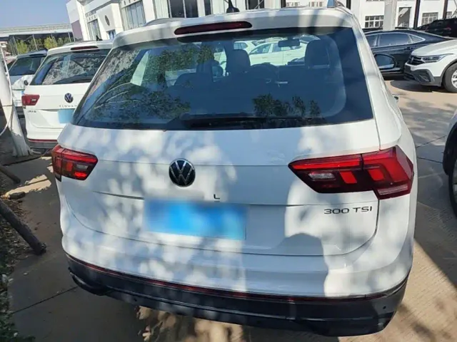 Volkswagen Tiguan L — Фото автомобиля 5