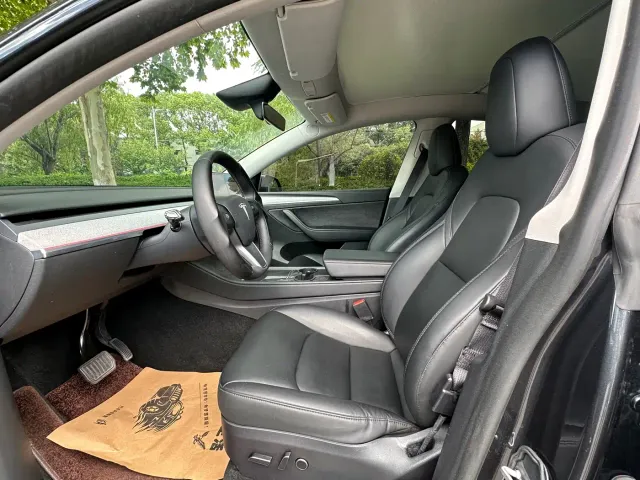 Tesla Model Y — Фото автомобиля 7