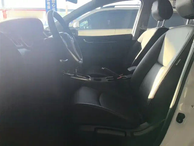 Nissan Tiida — Фото автомобиля 14