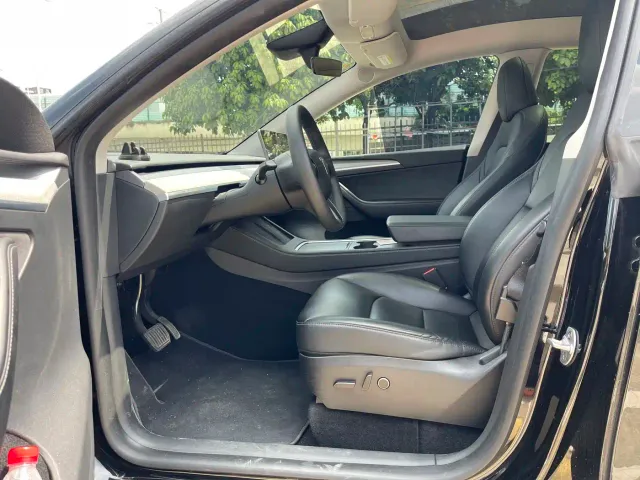 Tesla Model Y — Фото автомобиля 6