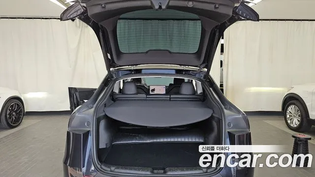 Tesla Model Y — Фото автомобиля 20