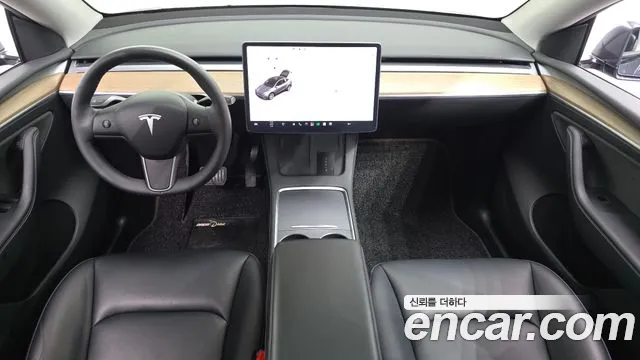 Tesla Model Y — Фото автомобиля 7