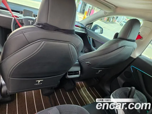 Tesla Model Y — Фото автомобиля 10