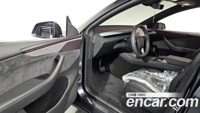 Tesla Model Y — Фото автомобиля 10