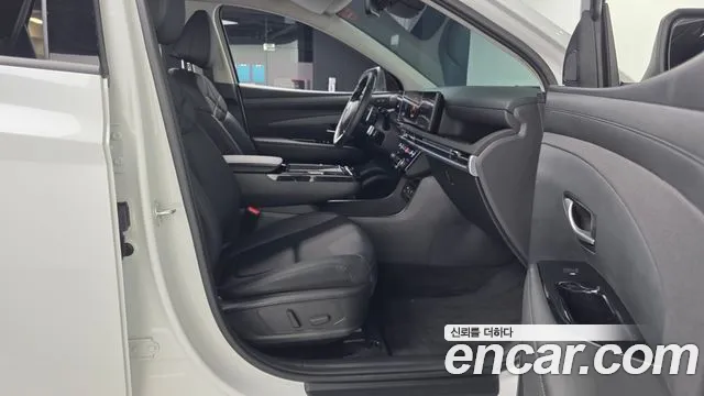 Hyundai Tucson Новый Tucson (NX4) Бензин 1.6 турбо 2WD — Фото автомобиля 11