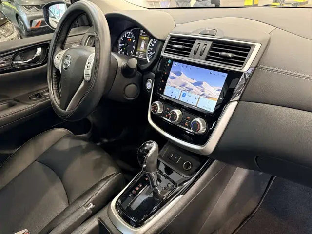 Nissan Tiida — Фото автомобиля 20