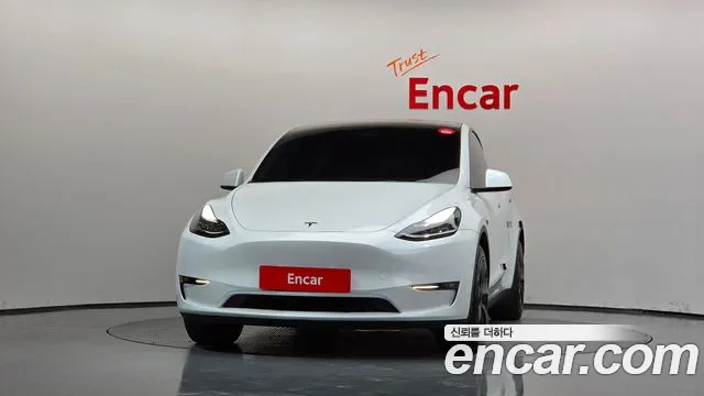 Tesla Model Y — Фото автомобиля 3